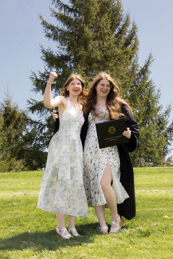 College graduate with friend
