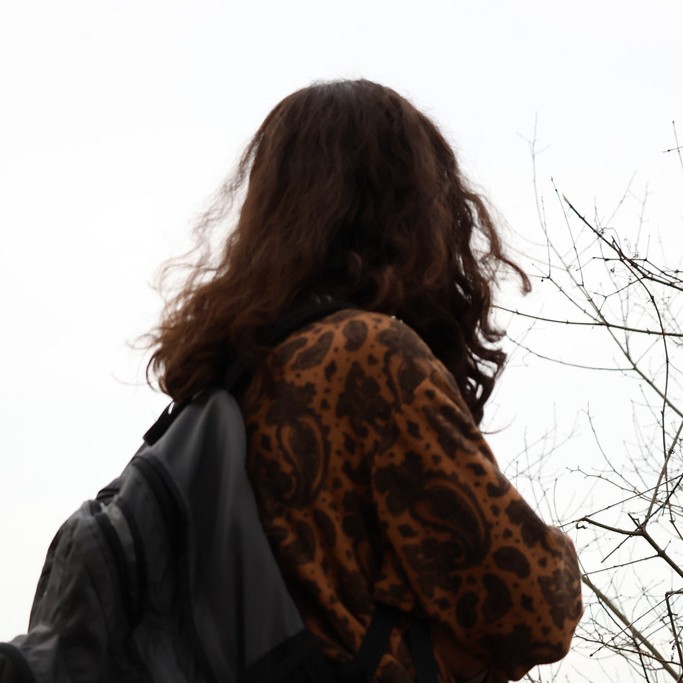 Out of focus person looking up